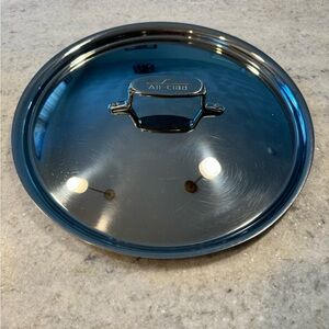 All Clad cover fits 12.5 diameter All Clad 4 QT pan. Hardly used/no returns